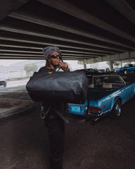 THE GOLDEN FANG SHARK DUFFLE
