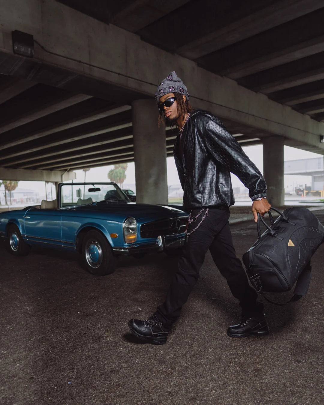 THE GOLDEN FANG SHARK DUFFLE