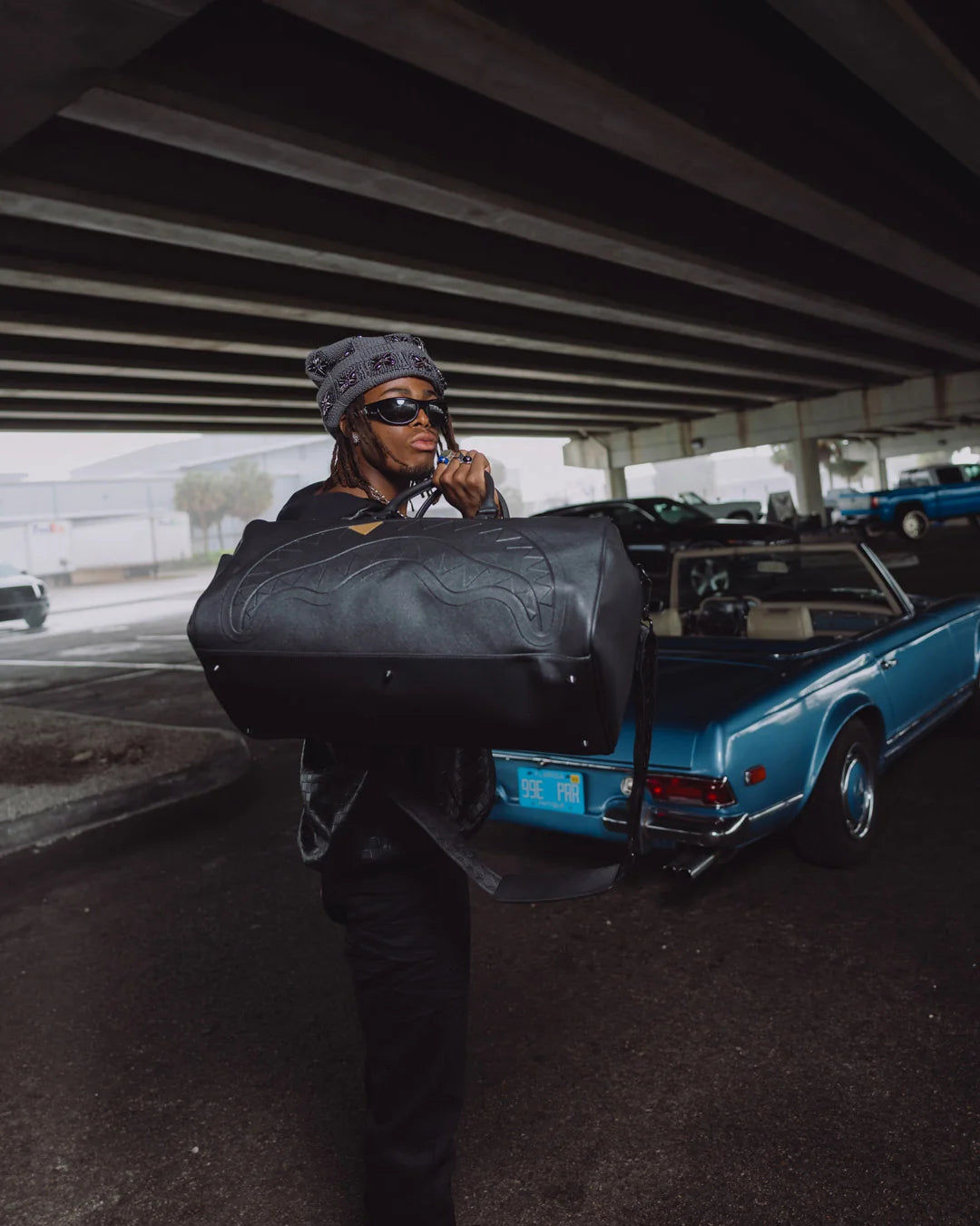 THE GOLDEN FANG SHARK DUFFLE