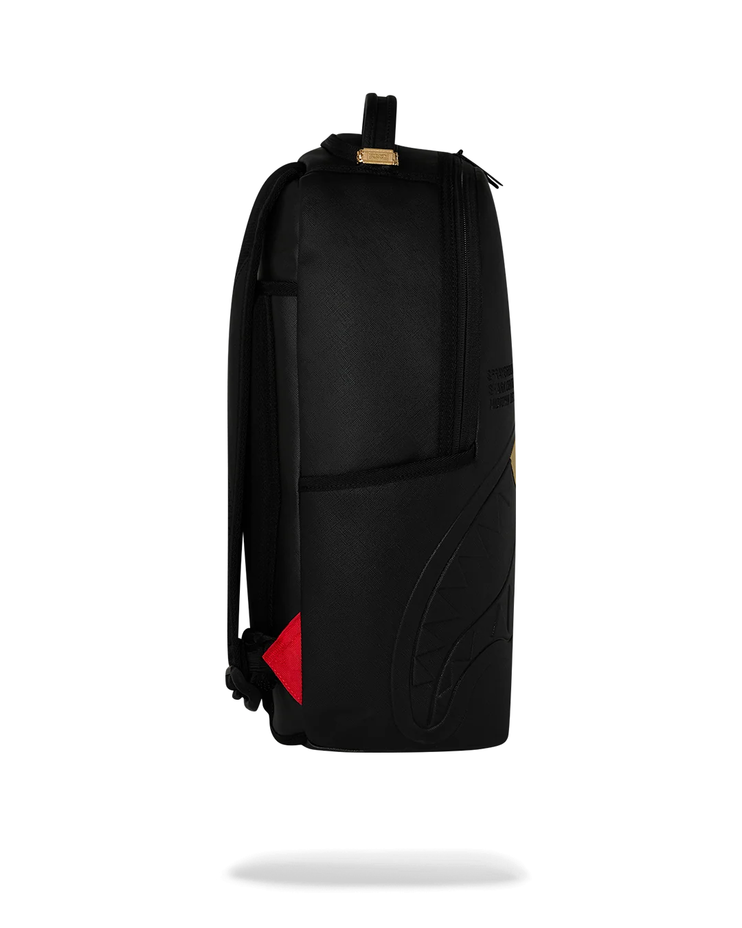 THE GOLDEN FANG SHARK BACKPACK
